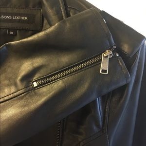 Black genuine leather Moto jacket XL.  NEW with tags.  Never worn.